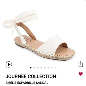 Like new Journey collection white espadrilles.